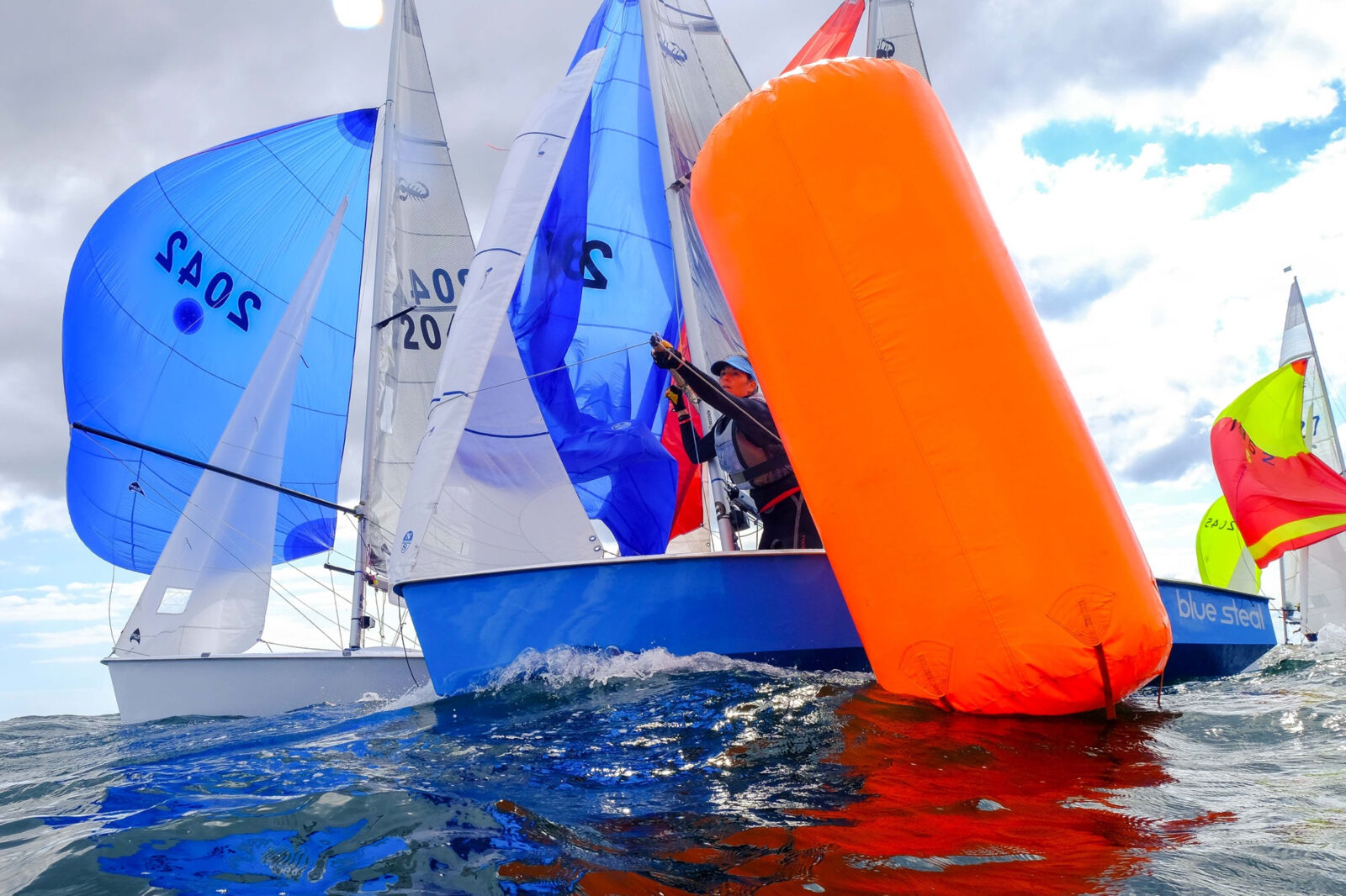 Sailing boats with colourful jibs